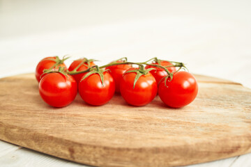food wooden board cherry tomatoes organic close-up