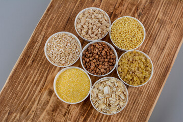 Large group of wholegrain food shot on rustic wooden table