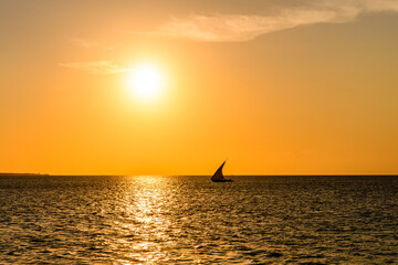 Traditional sail boat at the Indian ocean when sunset