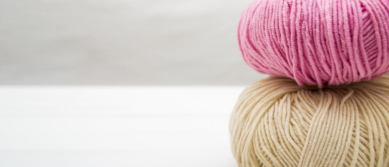 Yarn in skeins. Threads for knitting on top of each other. Yarn background with copy space.