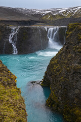 Picturesque waterfall Sigoldufoss autumn view. Season changing in southern Highlands of Iceland.