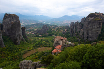 Fototapeta na wymiar Great view of the ancient monasteries and the impressive and picturesque valley of Meteora, Greece