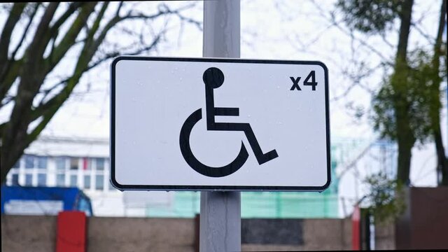 Accessible Parking Spots Marked with International Disability Symbol Road Sign