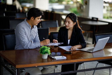 legal and businessman advisor, two business people talking, planning analyze investment and marketing on a tablet at outdow office.