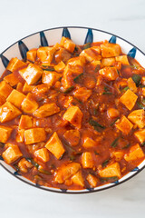 Mapo Tofu - The traditional Sichuan dish of silken tofu and ground beef, packed with mala flavor from chili oil and Sichuan peppercorns.