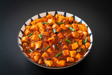 Mapo Tofu - The traditional Sichuan dish of silken tofu and ground beef, packed with mala flavor from chili oil and Sichuan peppercorns.