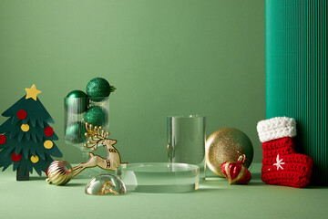 A front view of transparent podium in green background with christmas ornament decorate and blank...