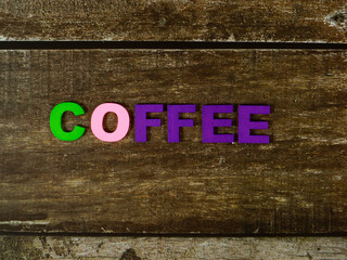 coffee wording colorful wooden on wood background