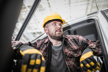 Caucasian Contractor Worker Inside His Pickup Truck