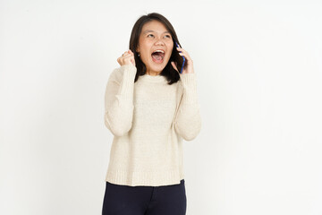 Talking on the phone and excited of Beautiful Asian Woman Isolated On White Background