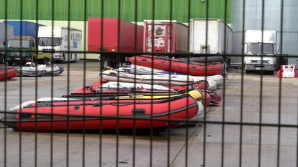 Boats used by the migrants to cross the English Channel are confiscated by the UK Border Force and stored near Dover in Kent, UK.
