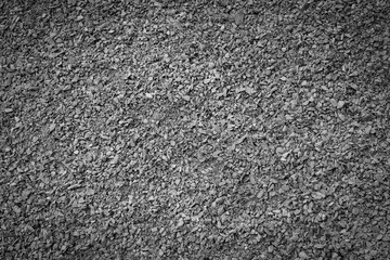 Small black stone decorative on ground background