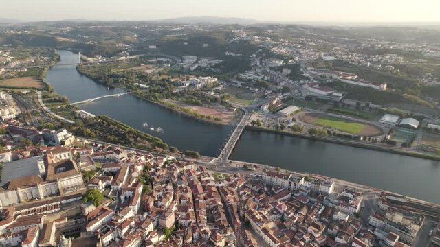 Panoramic view of Coimbra city, Portugal. Aerial orbit