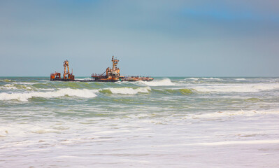 Shipwreck Zeila with power sea wave - Skeleton Coast, Henties Bay, Namibia
