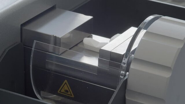 Laboratory pillbox test. The pill is subjected to pressure in a hardness testing machine