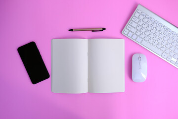 notebook and pen on the table