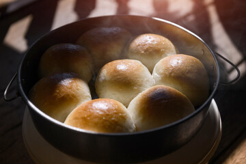 Home made baked round white breads.