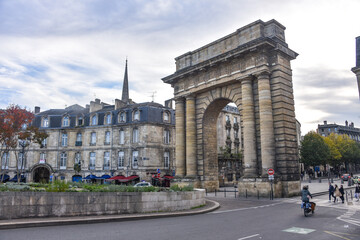 Fototapeta na wymiar Bordeaux, France - 8 Nov, 2021: Port du Bourgogne, Landmark Roman-style stone arch built in the 1750s as a symbolic gateway to the city