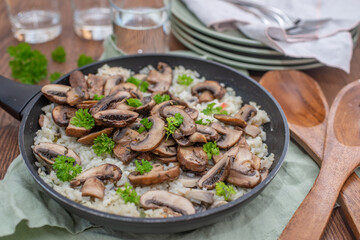 classic creamy italian mushroom risotto on a table