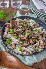 classic creamy italian mushroom risotto on a table