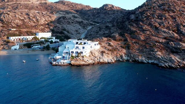 aerial view of houses on the beach mountains in ios island. Ios island is located in the Cyclades group in the Aegean Sea. Popular destination videos in greece.