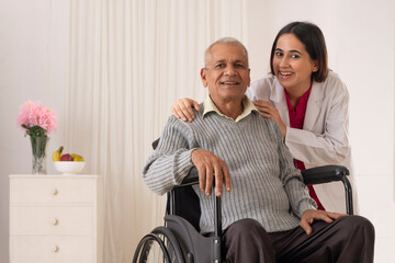 Nurse taking care of the senior patient sitting on wheel chair