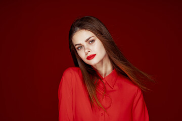woman in red shirt posing fashion red lips fun