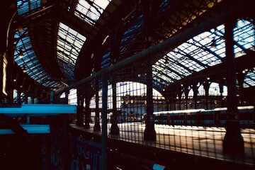 stained window in roof of a victorian train station