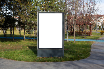 Blank billboard in the public park