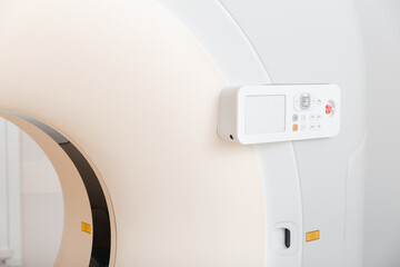 Medical CT or MRI Scan in the modern hospital laboratory. Interior of radiography department. Technologically advanced equipment in white room. Magnetic resonance diagnostics machine.