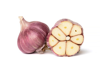 Red garlic and garlic clove in section isolated on a white background, close-up