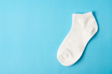 White socks on blue background.