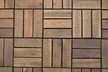evocative texture image of square shaped wooden dowels for flooring 