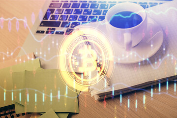 Double exposure of crypto technology drawing and desktop with coffee and items on table background. Concept of blockchain