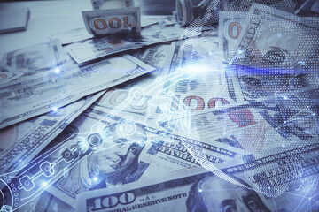 Double exposure of tech theme drawing over usa dollars bill background. Concept of technology.