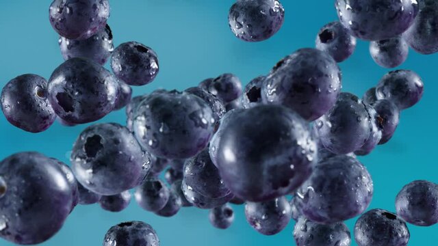 Flying of Blueberries in Sky Blue Background