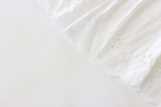 Background of white embroidered delicate lace fabric