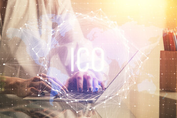 Double exposure of woman hands typing on computer and crypto market theme hologram drawing. Blockchain concept.