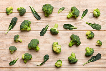 green fresh broccoli background close up on colored table. Vegetables for diet and healthy eating. Organic food