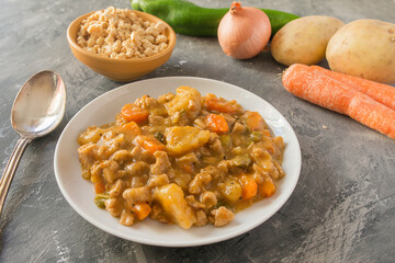 Stew with textured soy (vegan stew onion, potatoes, pepper, carrot, soy)