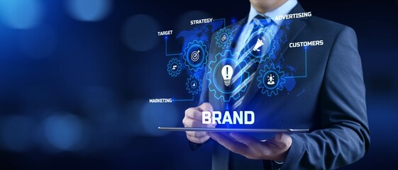 Brand development marketing strategy concept. Businessman pressing button on screen.