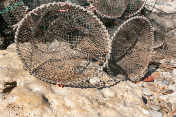 Beautiful sunset landscape with sea beach and fishing net