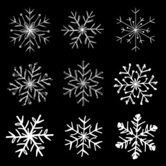 Fototapeta na wymiar A set of 9 hand-made snowflakes. Winter template for the designer. Isolate on a black background. Illustration.