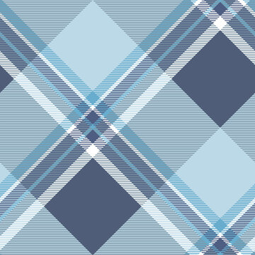 Seamless plaid pattern in dusty navy, light blue and white. All over diagonal repeat.