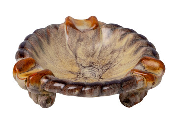 Antiques and art. Close-up of an ancient red brown ceramic ashtray isolated on a white background. Macro.