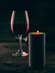 Wine and candle - obrazy, fototapety, plakaty
