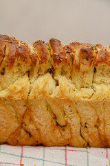 Freshly baked homemade garlic bread with seasam seeds.