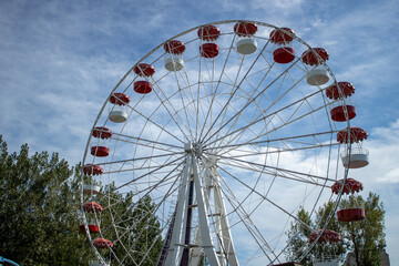 Empty Astrakhan Ferris wheel. Nobody in the amusement park due to quarantine restrictions.