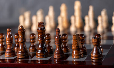 wooden chess on a dark background