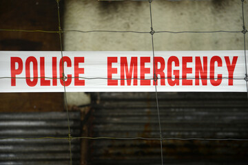 police emergency tape at a crime scene